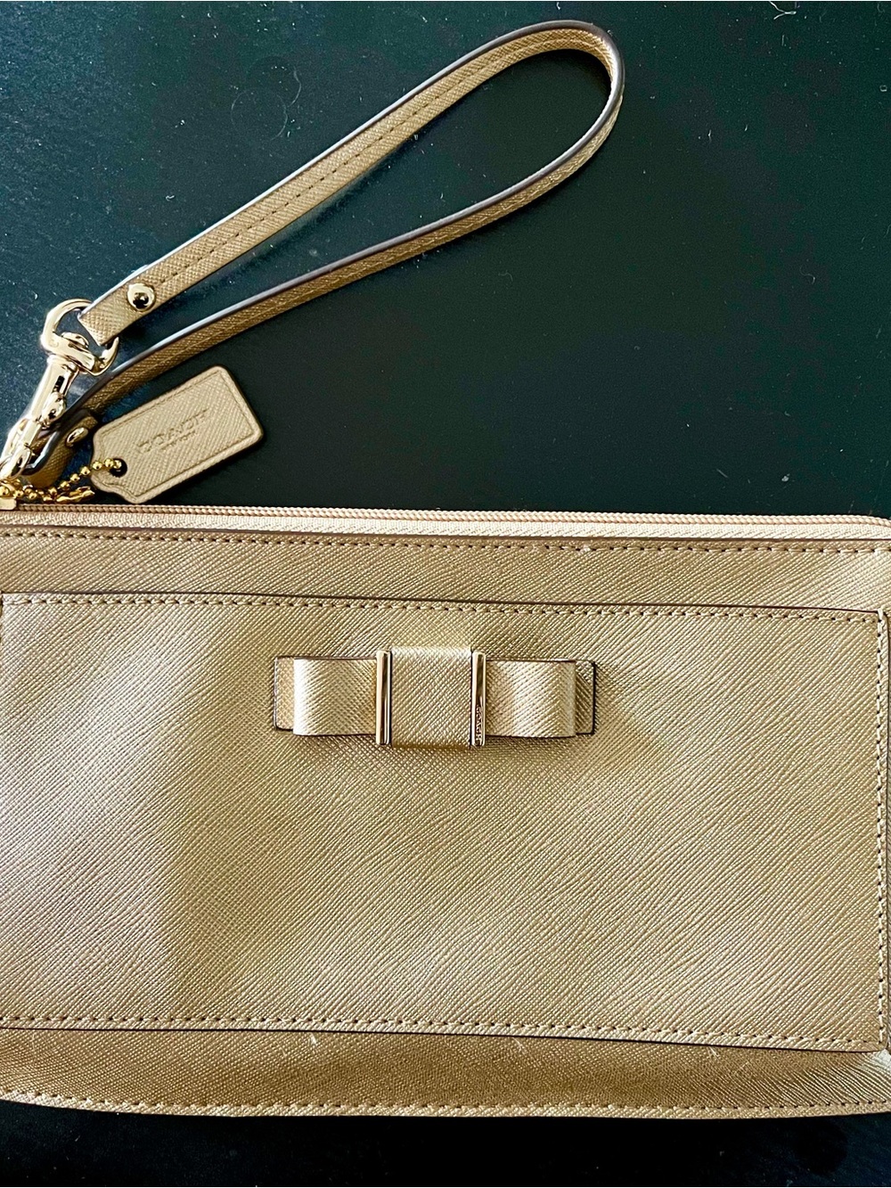 Coach Metallic Gold Wristlet with Center Bow
